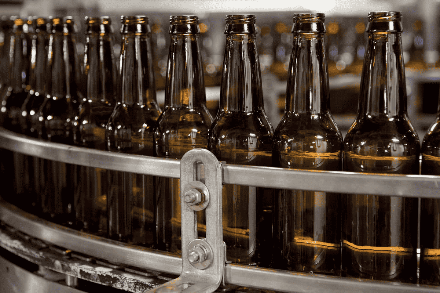 A photo of cleaned glass bottles ready for filling