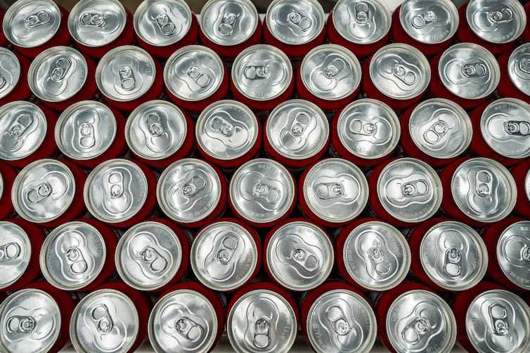 Top-down photo of many beverage cans